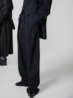 Slim fit yet wide leg at bottom. Double pleated suit trousers. Navy, with pin stripe detail. Model is in MINUSEY S. ✔️ Free worldwide express shipping over $100 ✔️ Loved by 6,500+ customers ✔️ Limited edition collections, maximum style ⠀⠀⠀⠀⠀⠀⠀⠀⠀ Stay ahead of the trend with can’t-find-anywhere-else staples. Your closet will thank you 💕 * MINUSEY S = EU 34, US 2* MINUSEY M = EU 36, US 4* 100% Wool* Dry clean* Made in Korea - Model Height: 170cm/5'7" (US2, EU34) Classic Pinstripe Wide Leg Dress Pants, Classic Pinstripe Wide-leg Dress Pants, Elegant Pinstripe Wide Leg Pants For Business Casual, Tailored Pinstripe Wide-leg Pants, Tailored Pinstripe Wide Leg Pants For Formal Occasions, Formal Pinstripe Wide Leg Pants, Formal Striped Bottoms For Fall, Pinstripe Bottoms For Formal Occasions In Fall, Pinstripe Wide Leg Pants For Work