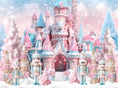 a pink and blue castle surrounded by trees in the snow with candy canes all around it