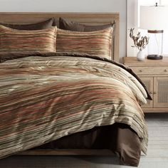 the comforter is neatly made and ready to be used in the bedroom or living room