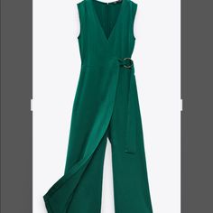 Long Sleeveless Jumpsuit With Wrapped V-Neckline And Pleats At Shoulders. Self Tie Belt With Metal Buckle. Back Hidden In Seam Zip Closure. Green V-neck Jumpsuit For Work, Chic Green V-neck Jumpsuit, Green V-neck Jumpsuits For Night Out, Elegant Sleeveless Green Pantsuit, Sleeveless Fitted Zara Pantsuit, Sleeveless Fitted Pantsuit By Zara, Zara Fitted Sleeveless Pantsuit, Green V-neck Jumpsuits And Rompers For Night Out, Zara Sleeveless Jumpsuits For Date Night