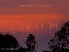 an image of the words zoom in front of trees at sunset with red clouds behind it