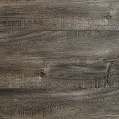 an image of wood flooring that looks like it has been painted in dark brown