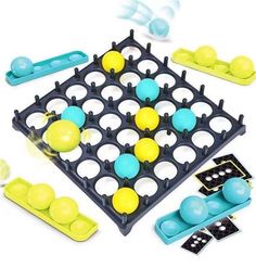 an image of a board game with balls and dominos