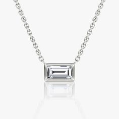 The Bezel Solitaire Necklace combines vintage-inspired detail and modern appeal together for a look that’s timelessly elegant. Marquise Pendant, Baguette Necklace, Jewellery Showroom, Solitaire Necklace, Bespoke Rings, Solitaire Necklaces, Baguette Cut, Accessories Jewelry Necklace, Three Stone