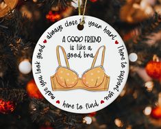 a christmas ornament with a bra on it