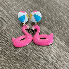 These metal flamingo inner tube earrings have a beach ball as the top earring stud are the perfect addition to your summer outfit. Beach Ball, Inner Tubes, Online Boutique, Flamingo, Stud Earrings, Pink