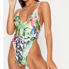 New Sexy One Piece Size Small Tropical Print High Rise New But Tsk Detached Brand New Without Tags Tropical Print Swimwear For Summer Party, Summer Party Swimwear With Tropical Print, Sleeveless Tropical Print Swimwear For Party, Summer High Waist Beachwear Bodysuit, High Waist Summer Beachwear Bodysuit, Tropical Print Beachwear For Parties, Summer High-waist Beachwear Bodysuit, High-waist Beachwear Bodysuit For Summer, Tropical Sleeveless Swimwear For Party