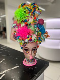 My post is about a mannequin with anything but hair on her head and I decided to use candy as my option 🍭 Manikin Head, Cosmetology Halloween Contest, Maniquin Dress Display Ideas, Anything But Hair Mannequin Project, Maniquin Head Ideas, Foam Mannequin Head Art