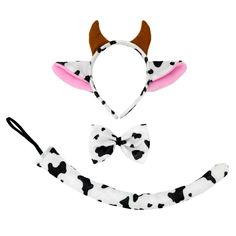 the dalmatian headband and bow tie set is made out of cow print