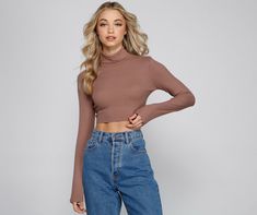 Keep it casual and chic with a crop top that is essential to your layered outfits! The top features a turtle neck. long sleeves. and a cropped hem. The top is composed of a ribbed knit fabric that offers a form hugging fit with a moderate stretch. Complete look with mom jeans and a plaid coat.Fit & Features Turtle neck Long sleeves Cropped hem Ribbed knit fabric Form hugging fit. moderate stretch Runs true to size Casual Solid Turtleneck Crop Top, Trendy Crop Top For Fall Layering, Trendy Crop Top For Layering In Fall, Fall Turtleneck Crop Top With Stretch, Fall Cropped Mock Neck Top, Stretch Turtleneck Crop Top For Fall, Fall Turtleneck Stretch Crop Top, Fall Stretch Turtleneck Crop Top, Casual Cropped Turtleneck For Fall