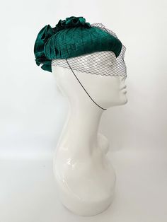 "Classic vintage hat. Perfect for Ascot, weddings, special occasions, very elegant. Comes with elastic to hold hat in place. Condition: vintage perfect Colour: teal Label: Made in England Material: satin Size: M inner circumference aprox. 21.5-22 inches, circumference 44\"\" *Please note all hats come securely packed in a box *All our vintage items come in clean and best condition possible *Please note all hats come securely packed in a box *All our vintage items are top quality authentic vintag Evening Cloche Hat For Royal Ascot, Evening Cloche Costume Hat For Kentucky Derby, Evening Cloche Hat For Kentucky Derby, Kentucky Derby Evening Cloche Costume Hat, Evening Kentucky Derby Cloche Costume Hat, Elegant Green Headpiece For Church, Vintage Cloche Headpieces For Evening, Victorian Cloche Hat For Evening, Victorian Evening Hats For Kentucky Derby