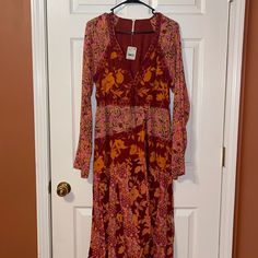 Free People Tilda Wrap Dress Size Small Nwt Beautiful Floral Pattern Fall Season Pink Printed Maxi Dress, Fall Pink Printed Maxi Dress, Pink Printed Maxi Dress For Fall, Pink Printed Midi Dress For Fall, Pink Fitted Maxi Dress With Boho Print, Fitted Pink Maxi Dress With Boho Print, Fitted Pink Boho Print Maxi Dress, Pink Floral Midi Dress For Fall, Fitted Long Sleeve Dresses With Boho Print