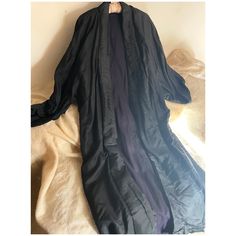 Black silk antique kimono coat or gown ... just amazing item to own and utterly wearable..., lined in a delicious dark grape colour.... an authentic antique piece Length from neck back to hem 132 cm  Chest at back arm to arm. 60 cm Elegant Long Purple Kimono, Black Long Evening Robe, Long Black Evening Robe, Black Silk Long Sleeve Robe, Silk Open Front Evening Kimono, Silk Open Front Kimono For Evening, Long Silk Evening Kimono, Black Silk Evening Kimono, Formal Long Silk Robe