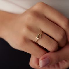 Elegant 14K Gold Minimalist Rings by Yunka Jewelry Discover the timeless elegance of our 14K gold minimalist rings, meticulously crafted to add a touch of sophistication to any outfit. Whether you prefer stacking them together or wearing them solo, these dainty rings are perfect for everyday wear or special occasions. Each ring is designed with unique elements, from delicate hearts and butterflies to intricate twists and geometric shapes, ensuring there's a perfect match for every style. Product Delicate 14k Gold Heart Ring For Everyday, Delicate Everyday Heart Ring In 14k Gold, Delicate Everyday 14k Gold Heart Ring, Elegant 14k Gold Everyday Heart Ring, Simple Yellow Gold Heart Ring For Anniversary, Elegant Heart Cut Rings For Everyday, Elegant Everyday Heart Cut Ring, Elegant Sterling Silver Heart Ring For Everyday, Minimalist 14k Gold Heart Promise Ring