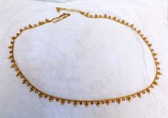 * Beautifully designed gold color belly chain. * can be used with belly dance costumes and saris. * Adjustable from 25 to 41 inches waist. * D.no.1 * D.no.2 *D.no.3 *D.no.4 Bohemian Gold Waist Chain For Festivals, Traditional Gold Bridal Belt With Tilla, Gold Bridal Belt For Festive Occasion, Temple Jewelry Style, Gold Temple Jewelry Bridal Belt For Festive Occasion, Festive Gold Bridal Belt In Temple Jewelry Style, Bohemian Gold Beads Waist Chain For Festivals, Gold Bridal Belt For Diwali Ceremonial, Gold Bollywood Waist Chain For Wedding, Bollywood Gold Waist Chain For Weddings