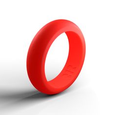 a red ring is shown on a white surface