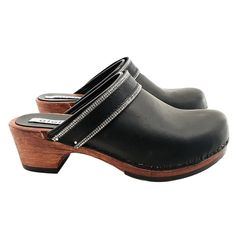 Clog made in Italy with black base in POLYURETHANE (wood effect) Upper in black leather - also ideal for sanitary use Entirely made by specialized Italian personnel Handcrafted using the best materials Heel height 5 cm-Non-slip Rubber Very comfortable and elegant. White Clogs, Swedish Women, Black Clogs, Mule Shoes, Clogs And Mules, Wooden Clogs, Women's Clogs, Clog Heels, Comfortable Heels