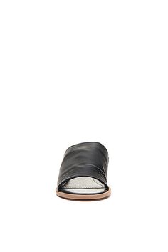 Ruthie Slide Sandals by Kelsi Dagger Brooklyn in Black, Women's, Size: 6.5, Leather/Rubber/Polyurethane at Anthropologie Leather Open Toe Slip-on Slides, Leather Slip-on Open Toe Slides, Modern Synthetic Sandals With Wrapped Heel, Medium Width Flat Leather Sandals, Leather Mules With Wrapped Flat Heel, Black Leather Mules For Summer, Summer Leather Slip-on Slingback Sandals, Leather Slide Wedge Sandals, Summer Leather Slip-on Heels