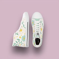 Step into spring with our Women's High Top Canvas Sneakers featuring a charming daisy flower pattern in soft pastel shades of green, white, and yellow. Crafted by Urban Sole Shoe Boutique and designed for style and comfort, these sneakers are made with breathable polyester canvas and hi-poly deodorant memory foam insoles, ensuring all-day comfort and durability. The white sole and laces, complemented by silver metal eyelets and a durable pleather round toe, the tongue is plain in color and taken Shoes Pattern Design, Casual Spring High-top Sneakers With Flat Heel, Green Sneakers With Flat Heel For Spring, Trendy Spring High-top Sneakers With Flat Heel, Green Flat-heel Sneakers For Spring, Green Sneakers For Spring, Trendy Flat Heel High-top Sneakers For Spring, Trendy Floral Print Sneakers For Spring, Cream High-top Sneakers For Spring