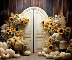 sunflowers and pumpkins are arranged in front of an open door with flowers