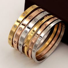 18k Gold Plated over Stainless Steel Great addition to your jewelry collection. Bracelet Cartier, Lovers Bracelet, Bangles Gold, Trending Bracelets, The Bangles, Cubic Zirconia Bracelet, Real Gold Jewelry, Bracelet Love, Crystal Bangle