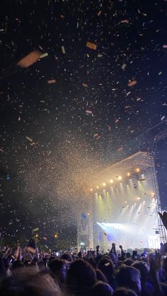 confetti is thrown in the air at a concert