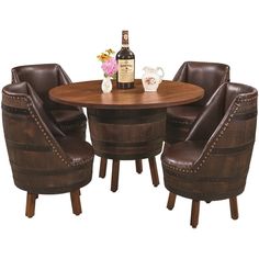 a round table with four chairs around it and a bottle of wine in the middle