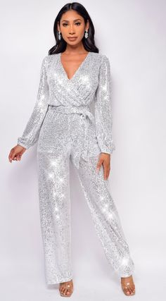 Full length Sequin bodice Long sleeve Waist belt Surplice front Model is wearing size Small