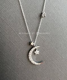 Simple everyday 925 Sterling Silver stars and CZ Embedded crescent Moon and Cross charm Necklace on 925 Sterling silver. This will make a great gift. *Cross measures approx. 6mm x 10mm *Star measures approx. 5mm *Moon Measures approx. 15mm x 20mm (same size as a Nickel coin) ---------------------------------------------------------------------- ** JEWELRY CARD OPTIONS ** please indicate your choice of a message or  your personals message in the message to seller as you check out. --------------- Silver Celestial Necklace For Her, Celestial Silver Necklace For Mother's Day, Celestial Sterling Silver Charm Necklaces With Clavicle Chain, Sterling Silver Celestial Charm Necklaces, Sterling Silver Celestial Charm Necklaces With Clavicle Chain, Elegant Moon Shaped Sterling Silver Charm Necklace, Elegant Crescent Jewelry With Star Charm, Elegant Sterling Silver Crescent Charm Necklace, Crescent Sterling Silver Necklace With Star Charm