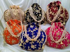 "Lot Of 20 Indian Handmade Women's Embroidered Clutch Purse Potli Bag Pouch Drawstring Bag Wedding Favor Return Gift For Guests Free Ship PRODUCT DETAIL :- -------------------------- Product Item : Embroidered Potli Bags Size : Length- 9\" x 9\" Inches Product Line: Rajasthani Ethnic Women Handbag Potli Bags Material -: Fabrics, Beads Occasion: Any Occasion, Festive, Party, Wedding, Bridal PRODUCT DESCRIPTION :- This colorful Clutch Purse with vibrant colors & ethnically designed is a specia Red Embroidered Potli Bag For Wedding, Elegant Multicolor Potli Bag With Dori Work, Elegant Multicolor Bag With Dori Work, Multicolor Handwork Pouch For Celebration, Elegant Multicolor Pouch With Zari Work, Elegant Multicolor Zari Work Pouch, Celebration Multicolor Handwork Pouch, Multicolor Handwork Bags For Wedding, Multicolor Pouch Bag For Wedding