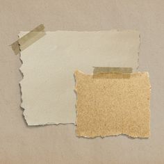 two pieces of torn brown paper on top of each other