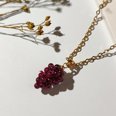 ♡ Beautiful Bespoke Jewelry ♡   Hand assembled in the UK ✿ Material ✿  - Grape charm: natural garnet, brass - 18K gold plated necklace with Lobster Clasps and Extender Chain [SIZE]: Length of chain necklace is approx. 16.14 inch/41cm(excluding chain extender), extender chains: 70mm long, the width of chain necklace is 2 mm.    ✿ Packaging ✿ - Card mounted - Transparent plastic sleeve  ✿ Delivery ✿ - Royal Mail tracked 48hr ♡ Follow us on - IG: vachana.uk♡ Grape Necklace, Packaging Card, Fruit Necklace, Jewelry Hand, Chain Extenders, Bespoke Jewellery, Gold Plated Necklace, Red Garnet, Gold Plated Chains