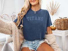 Cheer on your Tennessee Titans this football season with this cute and simple Comfort Colors T-shirt! This is a standard unisex size Comfort Colors Tee. It is 100% preshrunk cotton. For an oversized tee, please size up. Please review the size chart to ensure you receive the fit you want *Product Description - Custom Colors Unisex 1717 Garment Dyed t-shirt  100% ring spun cotton  Soft washed garment dyed fabric  Double needle collar  Twill taped neck and shoulders  Double needle armhole, sleeve a Tennessee Football, Football T Shirt, Tennessee Titans, Dye Shirt, Comfort Colors Tee, Football Season, Dyed Fabric, Oversized Tee, Dye T Shirt