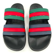 Gucci -Condition: Brand New Item With Original Box. -All Of Our Items Are 100% Authentic. -Size: Men's Uk 11 - Us 11.5 - Eu 45 (True To Size). -Color: Black / Red / Blue. -Rgr Rubber Sandals. -Featuring Signature Web Detailing, Double-Strap Design. -Demetra Uppers. -Embossed Branding. -Moulded Footbed. -Rubber Outsole. -Made In Italy. -Retails For $685.00 -Item Ships Out Within 24 Hours. Black Casual Gucci Slides, Casual Black Gucci Slides, Gucci Green Sandals With Round Toe, Gucci Black Slip-on Sandals, Black Gucci Slip-on Sandals, Multicolor Designer Gucci Sandals, Gucci Green Sandals With Branded Insole, Gucci Black Sandals With Rubber Sole, Gucci Green Flat Sandals