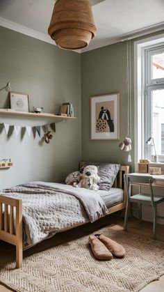 a bed room with a neatly made bed next to a window