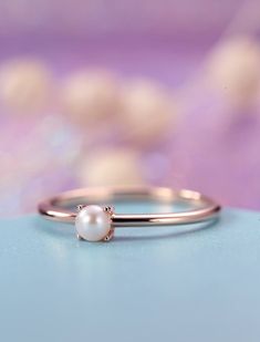 "Pearl engagement ring rose gold Simple Minimalist engagement ring Dainty Delicate Akoya Solid 14K Bridal Jewelry Promise Anniversary ≫≫ Item Details Made to Order, All Handmade in the United States. Metal: Solid 14K & 18K Gold Gold Color: White gold, Rose gold, Yellow gold Akoya Pearl Pearl size:3.6mm Ring band:approx 1.4mm(width),1.1mm(thickness) Total weight: 1.5g Ring Size: We can make the ring in any ring size,If the ring size is not in the list,contact us,we'll custom make it for you! Anniversary Rose Gold Pearl Ring In 14k Gold, Rose Gold Simple Rings For Formal Occasions, Simple Design Rose Gold Diamond Ring With Round Band, Rose Gold Diamond Ring With Simple Round Band, Simple Rose Gold Rings For Formal Occasions, Rose Gold Simple Design Round Band Diamond Ring, Simple Rose Gold Diamond Ring With Round Band, 14k Rose Gold Stackable Rings For Wedding, 14k Rose Gold Stackable Wedding Rings