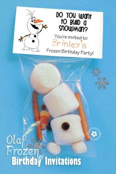 a frozen birthday party treat with marshmallows and carrots in the shape of a snowman