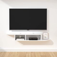 a flat screen tv mounted to the side of a wall