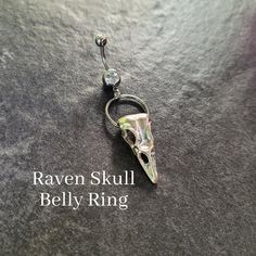 "Silver raven skull belly ring features a hoop and clear gem belly barbell.  316L surgical steel, hypoallergenic 14g 3/8\" bar Not quite what you're looking for?  Click here to see our other goth belly rings: https://www.etsy.com/shop/TikiTorchDesigns?ref=seller-platform-mcnav&search_query=goth+belly Goth Witchy Alt Punk Viking Celtic Witchy Grunge Aesthetics **Great gift for yourself or a friend!  Choose the gift message option when you check out if you want me to include a FREE gift bag.**" Witchy Grunge, Cute Belly Rings, Septum Piercing Jewelry, Bellybutton Piercings, Alt Grunge, Raven Bird, Navel Jewelry, Raven Skull, Bird Skull