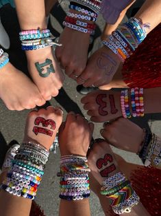 a group of people with their hands together