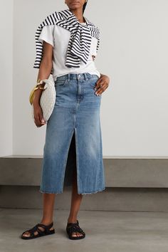 <i>PORTER</i> declares the denim skirt one of the most covetable items for Spring '23. Made in LA using organic denim, this one by SLVRLKE has a '90s-inspired, midi length with an open front and frayed hem. Spot clean it to minimize washing, and use a cold cycle when needed.<br><br>This product was Locally Made using Considered Materials. Find out more about NET SUSTAIN <a href="https://www.net-a-porter.com/en-gb/campaigns/net-sustain">here.</a& Denim Skirt Outfit Ideas, Midi Skirt Outfits Summer, Denim Skirt Outfit Summer, Looks Total Jeans, Denim Midi Skirt Outfit, Long Denim Skirt Outfit, Denim Skirt Outfit, Spring Skirt Outfits, Skirt Outfit Ideas