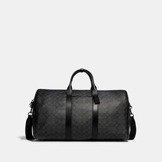 A bag as distinct as its namesake city the Gotham is a sleek streamlined style designed for travel. A no-fuss carryall this generously-sized (TSA compliant) Duffle features interior zip and slip pockets for easy organization and a convenient exterior pocket for access to essentials. Crafted of refined leather and our Signature canvas it’s secured by a zip closure and finished with a detachable strap for shoulder or crossbody wear. | Coach Gotham Duffle Bag In Signature Canvas - Black Copper/char Designer Business Travel Bag With Large Capacity, Black Coated Canvas Bags For Business Trips, Black Coated Canvas Bag For Business Trips, Classic Coated Canvas Business Bag, Classic Black Briefcase In Coated Canvas, Classic Black Coated Canvas Briefcase, Modern Coated Canvas Bags For Business, Modern Coated Canvas Bag For Business, Modern Business Bags In Coated Canvas