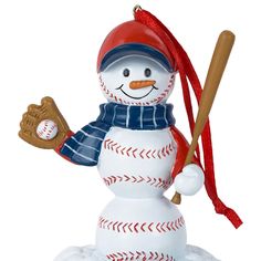 a baseball ornament with a snowman holding a bat