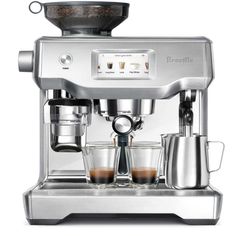 an espresso machine with two cups on it