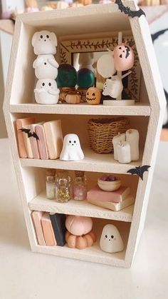 the shelves are decorated with halloween decorations