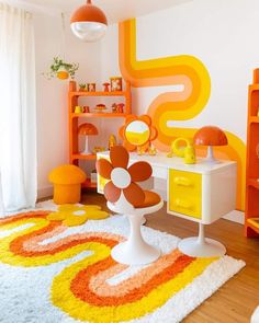 a child's room decorated in orange, yellow and white with an area rug