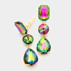 Triple Oil Spill Crystal Clip On EarringsItem: Clip-On EarringsVendor: Sparkle Armand Size: 0.75" W, 3" L (Inches) Color: Vitrail, Oil Spill, GoldShape: Teardrop, Round Metal: Alloy, Lead & Nickle Free Material: Crystal Theme: Evening, Bridal, Prom, Pageant All Measurements Are Approximate. Sold As One Pair Of Earrings Pageant Earrings, Premium Jewelry, Prom Earrings, Oil Spill, Long Drop Earrings, Beaded Dangle Earrings, Rhinestone Earrings, Color Crystal, Teardrop Earrings