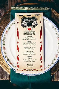 a table setting with a menu on it