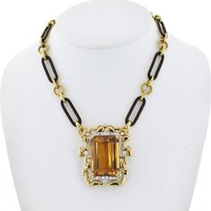 Imagine the enchantment of wearing a piece that is as versatile as it is captivating. Let me introduce you to the David Webb Large Topaz and Diamond Pendant on a Black Enamel Link Necklace, a true treasure from the 1980s. This extraordinary necklace is a testament to David Webb's timeless craftsmanship and ability to create pieces that transcend trends.What sets this necklace apart is its remarkable versatility. It can be worn in three stunning ways, allowing you to express your unique style eff David Webb, Necklace Stand, Yellow Jewelry, Topaz Pendant, Vintage Jewelry Necklace, The David, Brooch Necklace, Necklace Craft, Tennis Necklace