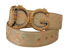 Elevate your ensemble with the exquisite craftsmanship of this luxurious leather belt from the esteemed house of Dolce & Gabbana. Boasting a chic pink hue complemented by a striking gold-tone logo-engraved buckle, this stunning accessory is more than just a belt—it’s a statement. With brand-new tags and coming in its original box, it’s guaranteed to add an opulent touch to any outfit. Perfect for cinching at the waist or accessorizing casually. Material: Leather Color: Pink, Gold Gender: Women L Dolce Gabbana Belt, Gold Color Combination, Dg Logo, Brown Leather Wallet, Wide Waist, Chic Pink, Elegant Accessories, Metallic Logo, Dolce & Gabbana